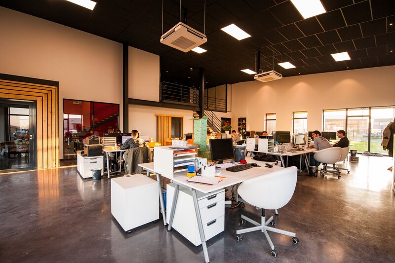 Modern open-plan office workspace at Karoto Management